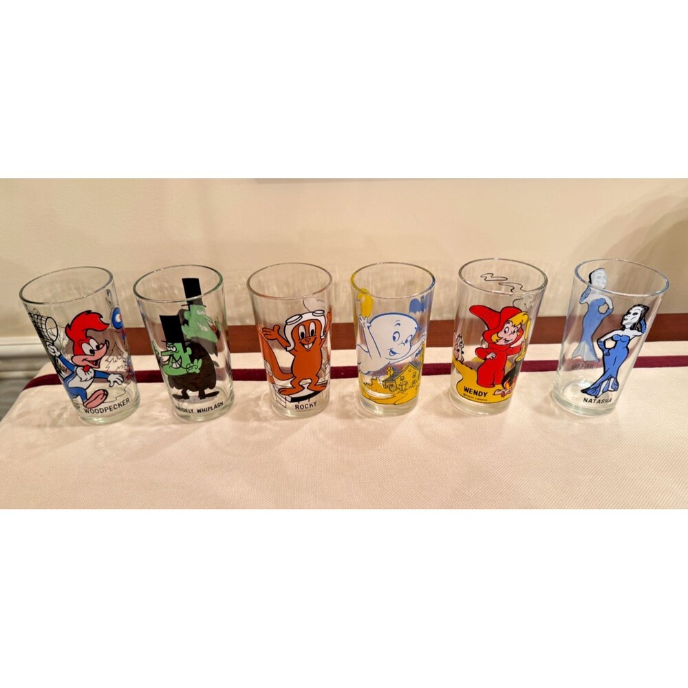 Vintage Pepsi Collector Series Glasses from the 1970s Featuring Various Cartoons